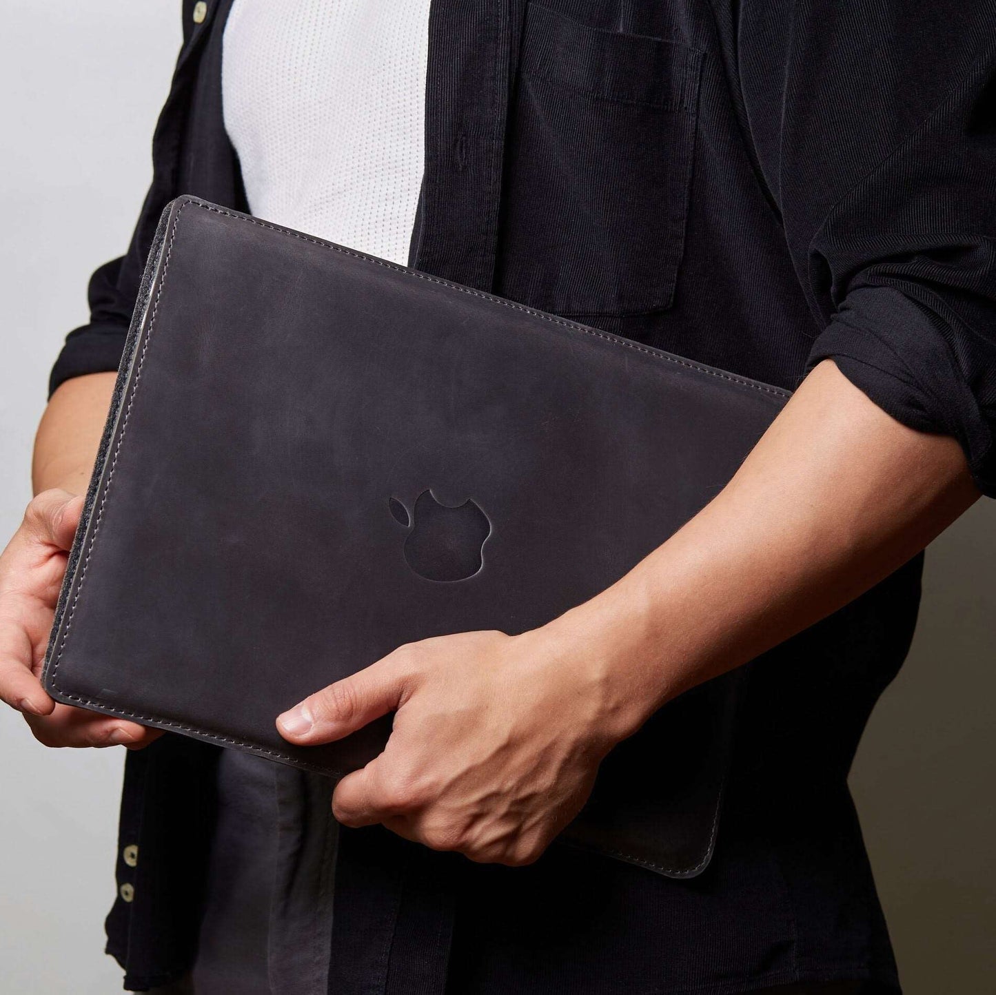 Leather MacBook sleeve with Apple logo