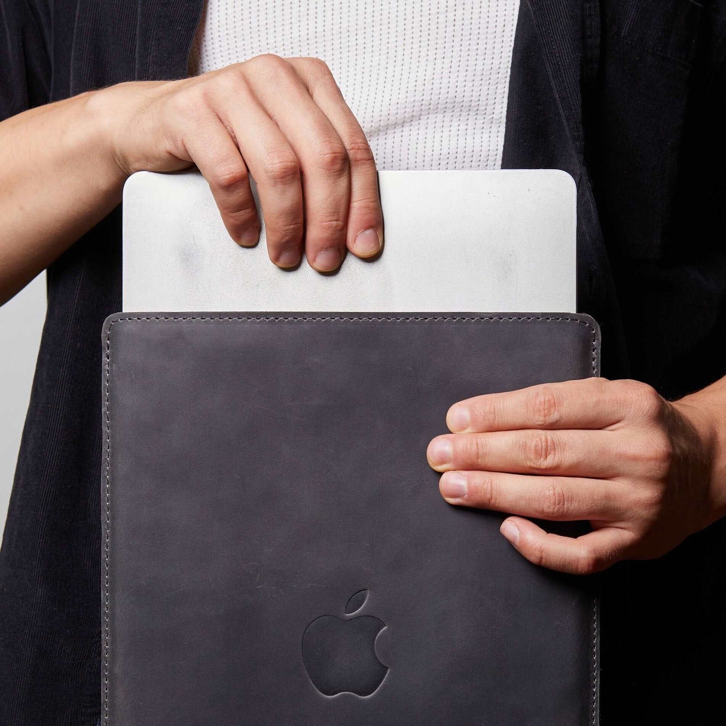 Leather MacBook sleeve with Apple logo