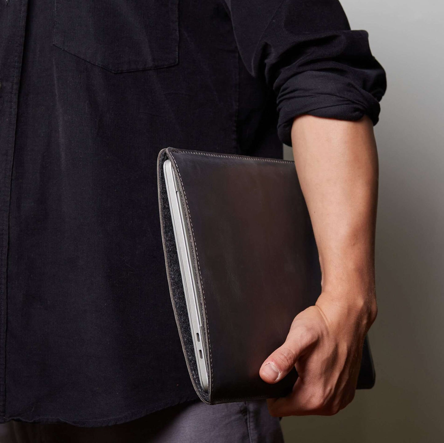Leather MacBook sleeve with Apple logo