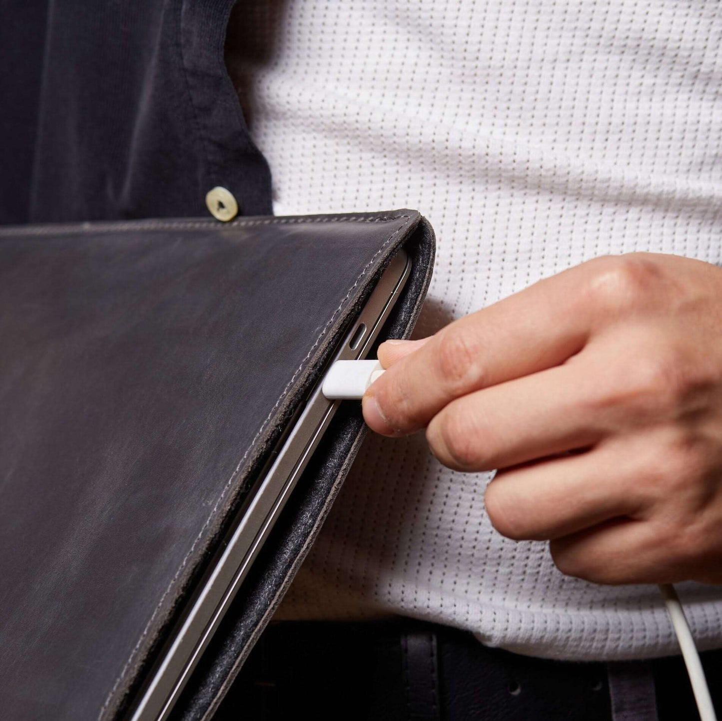 Leather MacBook sleeve with Apple logo