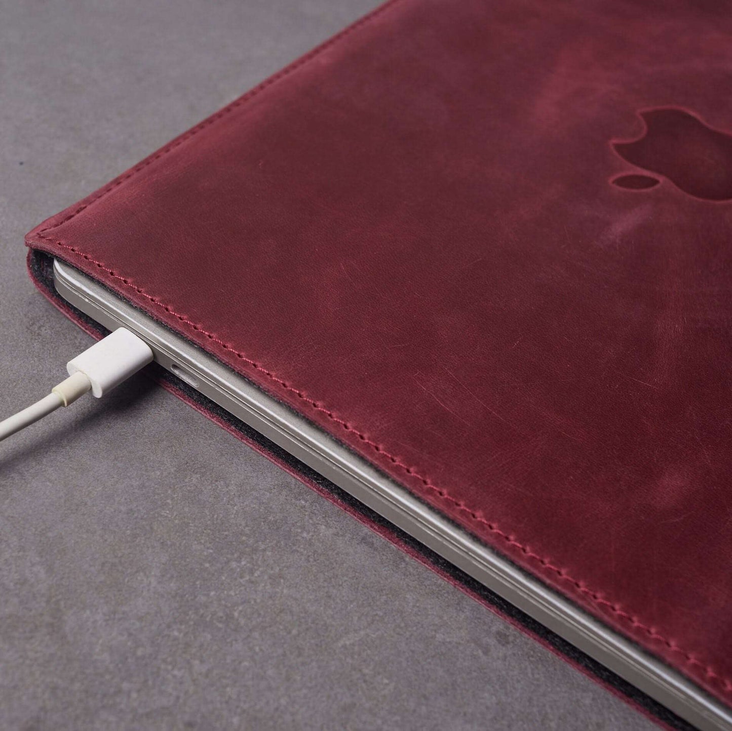 Leather MacBook sleeve with Apple logo