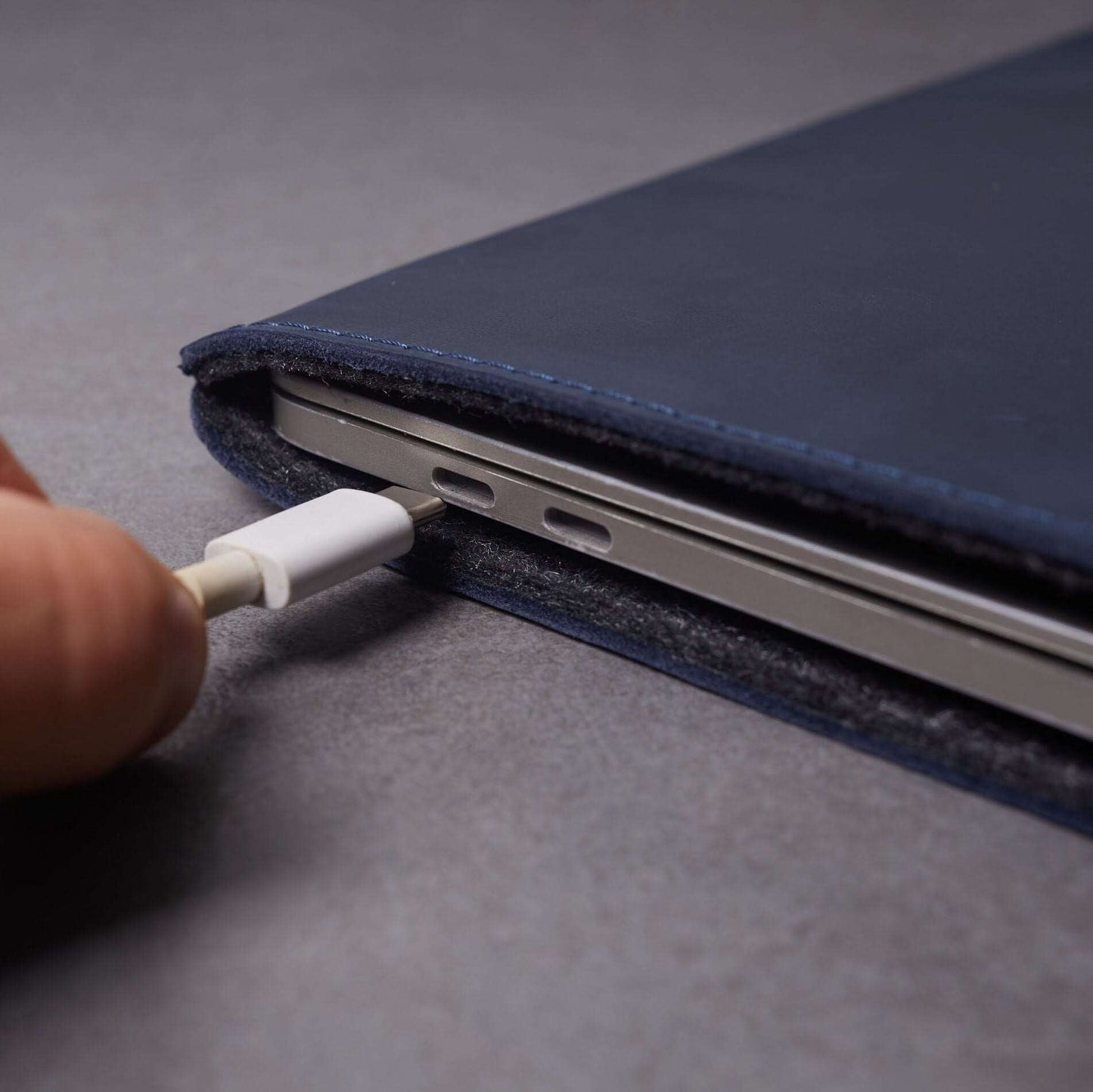 Leather MacBook sleeve with Apple logo