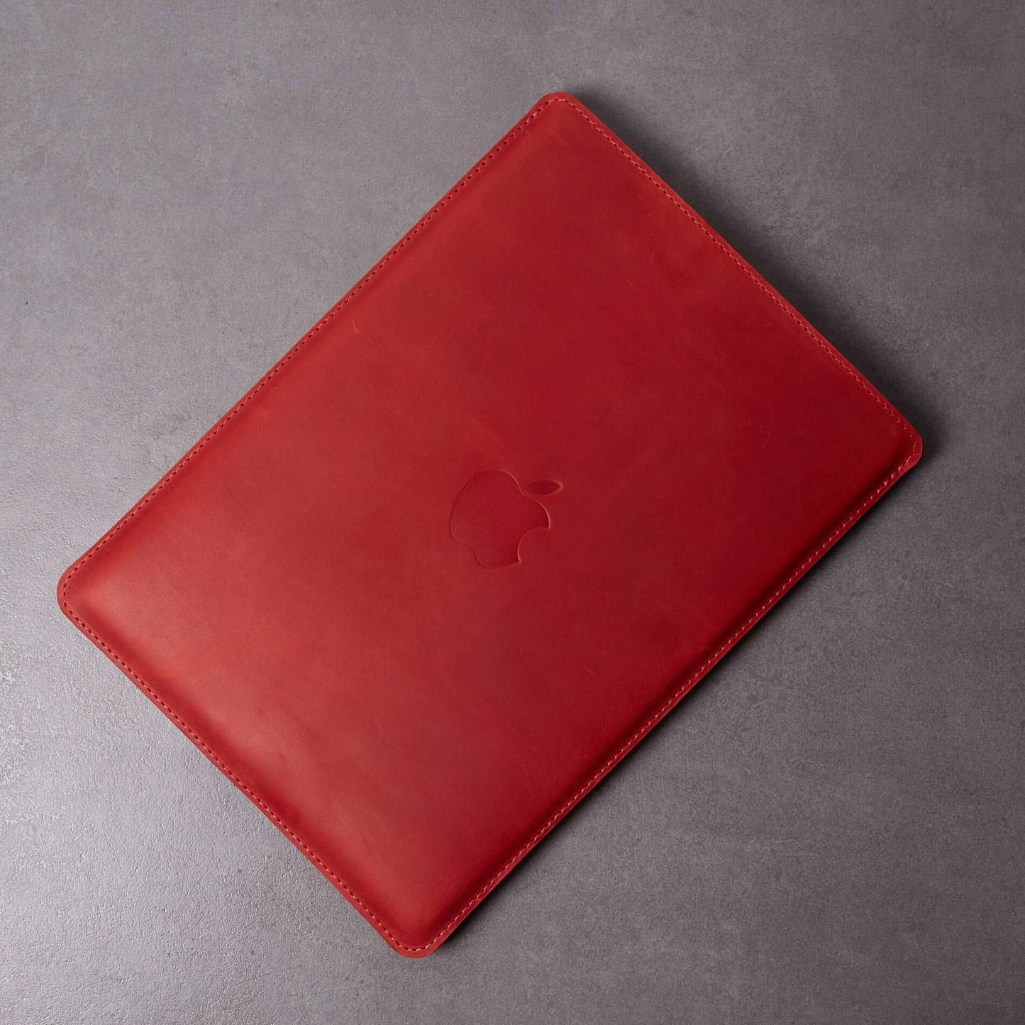 Leather MacBook sleeve with Apple logo