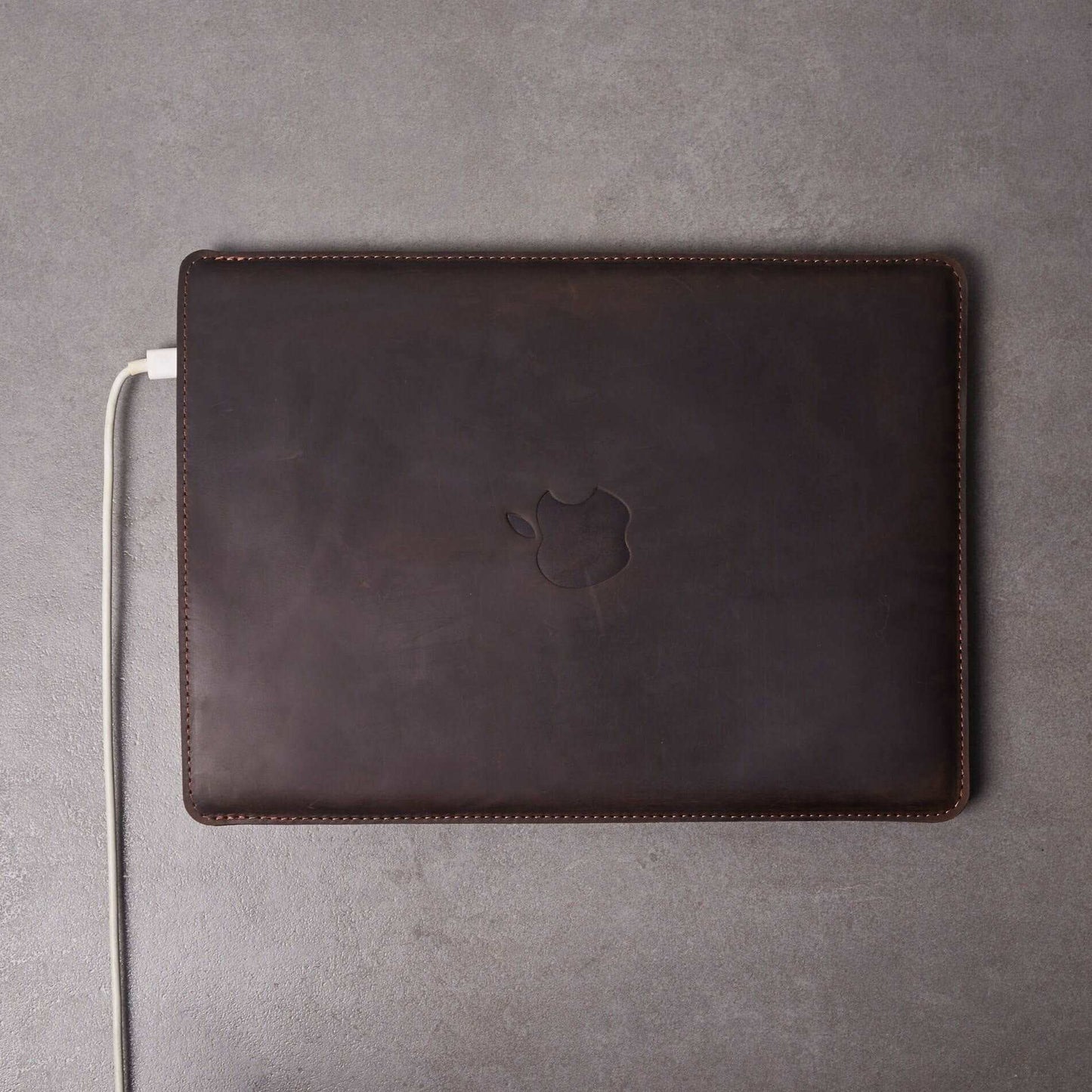 Leather MacBook sleeve with Apple logo