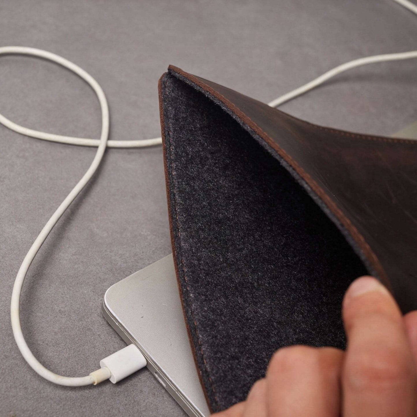 Leather MacBook sleeve with Apple logo