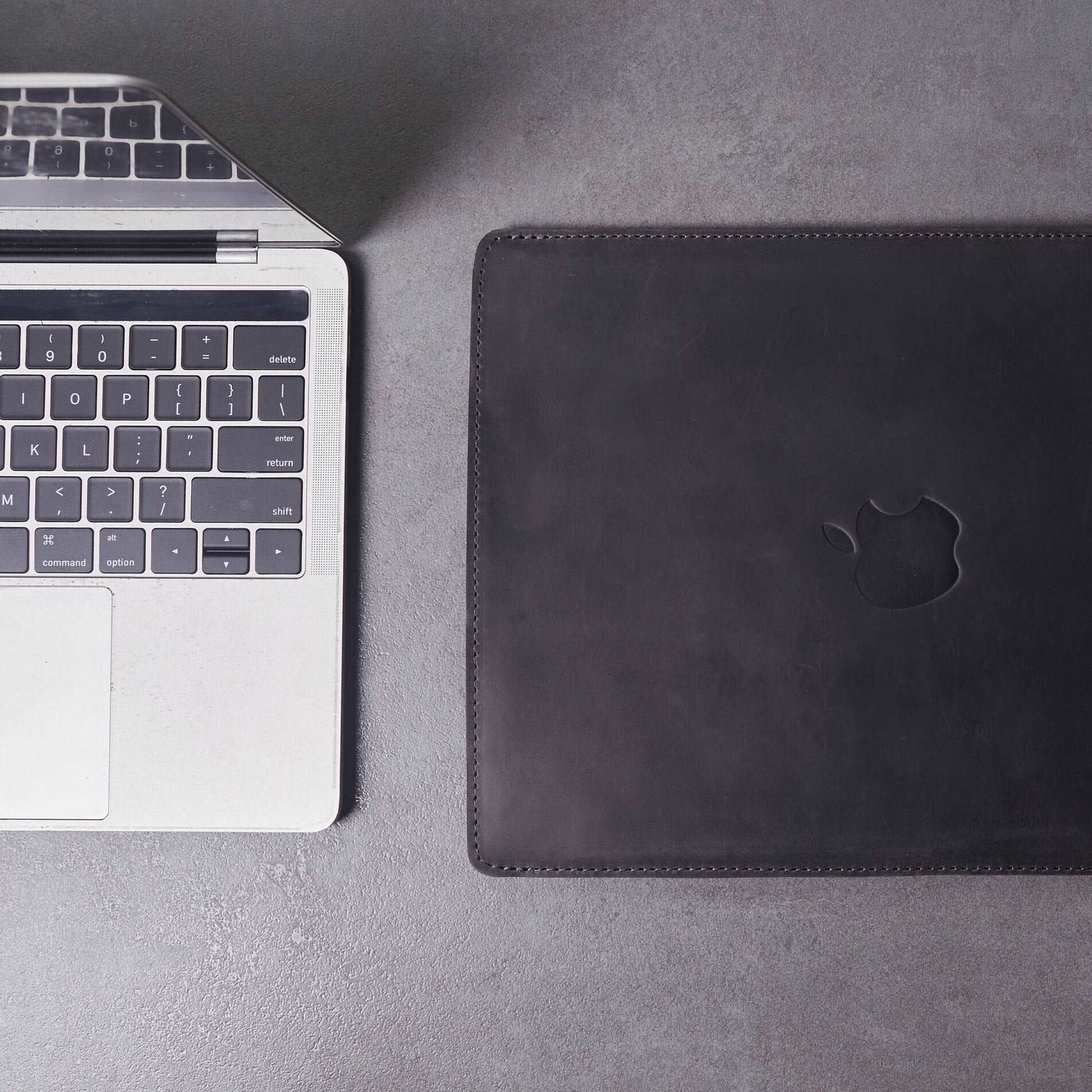 Leather MacBook sleeve with Apple logo